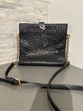 Thacker leather crossbody bag.
